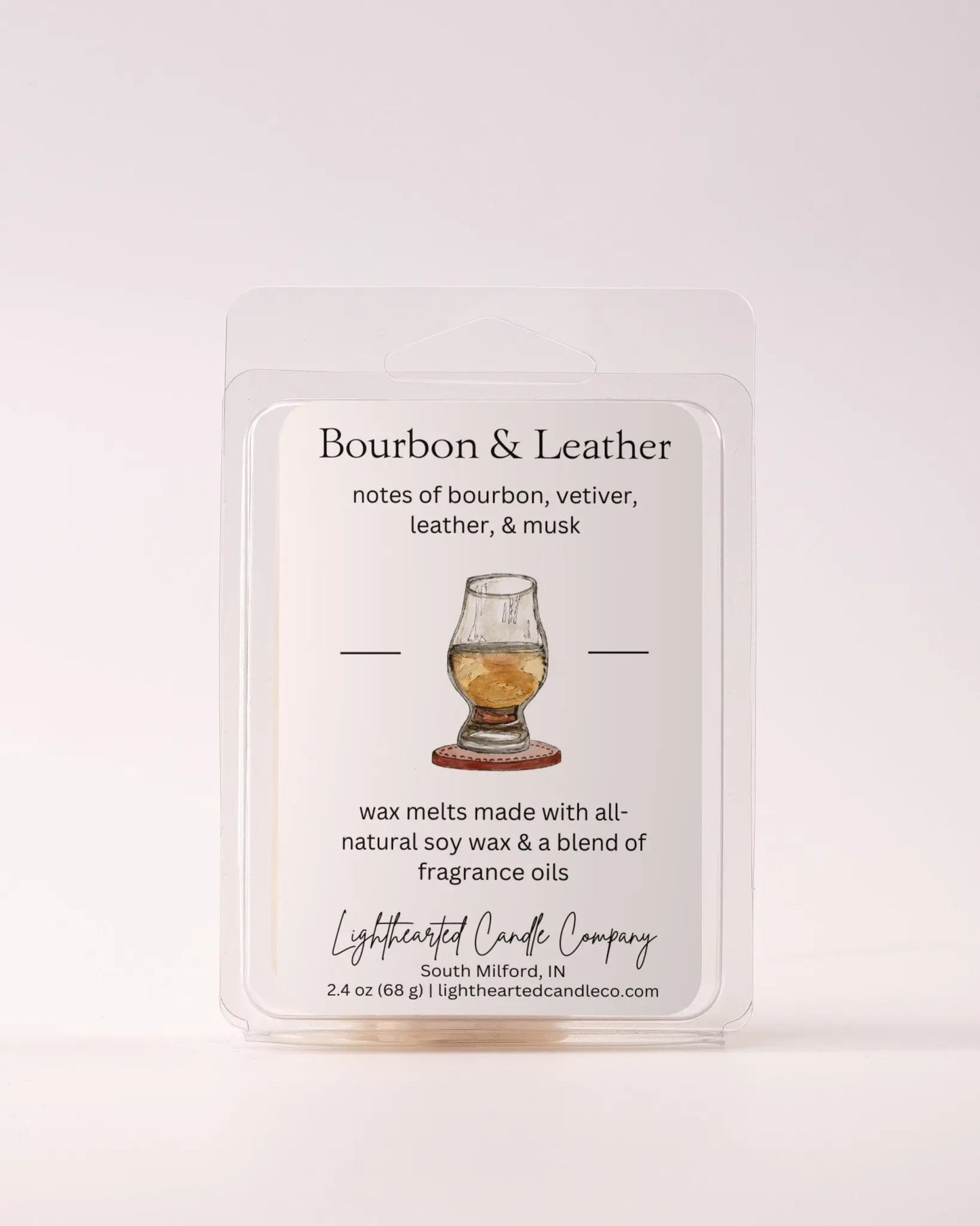 Single Bourbon & Leather Wax Melt 2.4 oz clamshell on a pale background