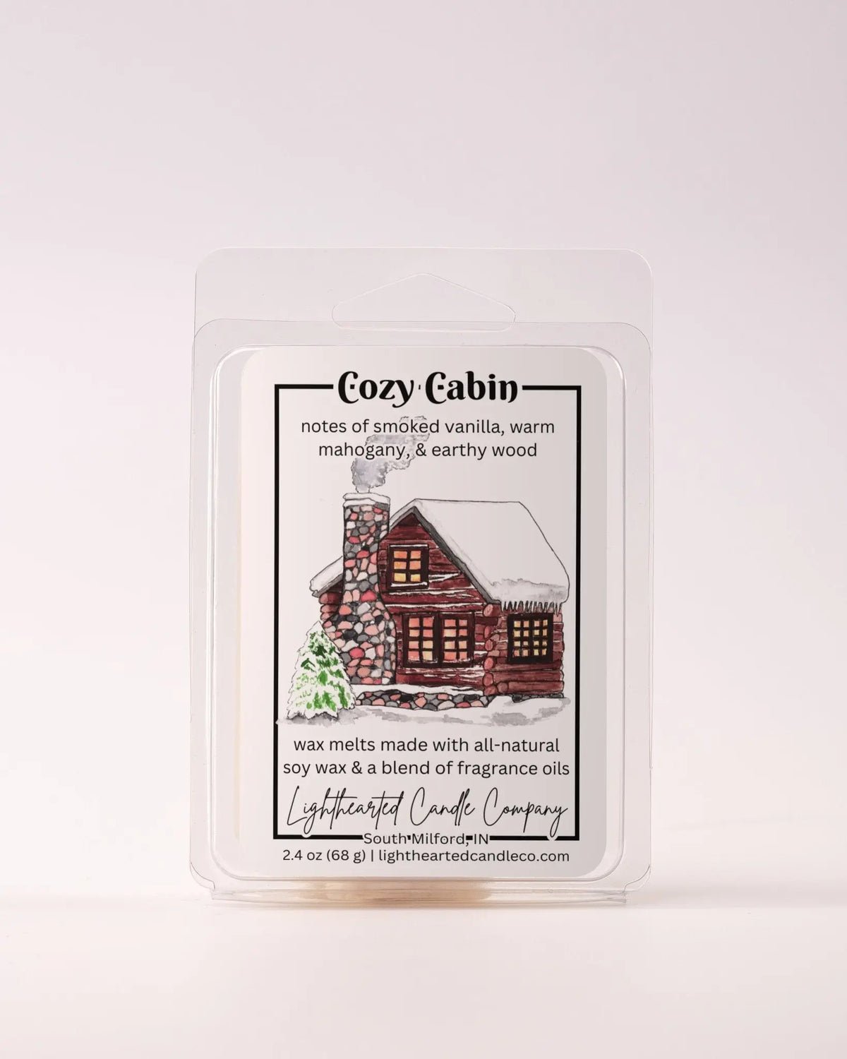 Single Cozy Cabin Wax Melt 2.4 oz clamshell on a pale background