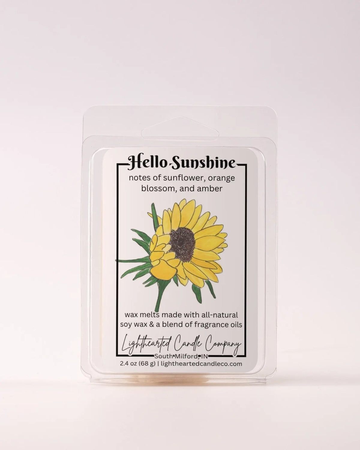 Single Hello Sunshine Wax Melt 2.4 oz clamshell on a pale background