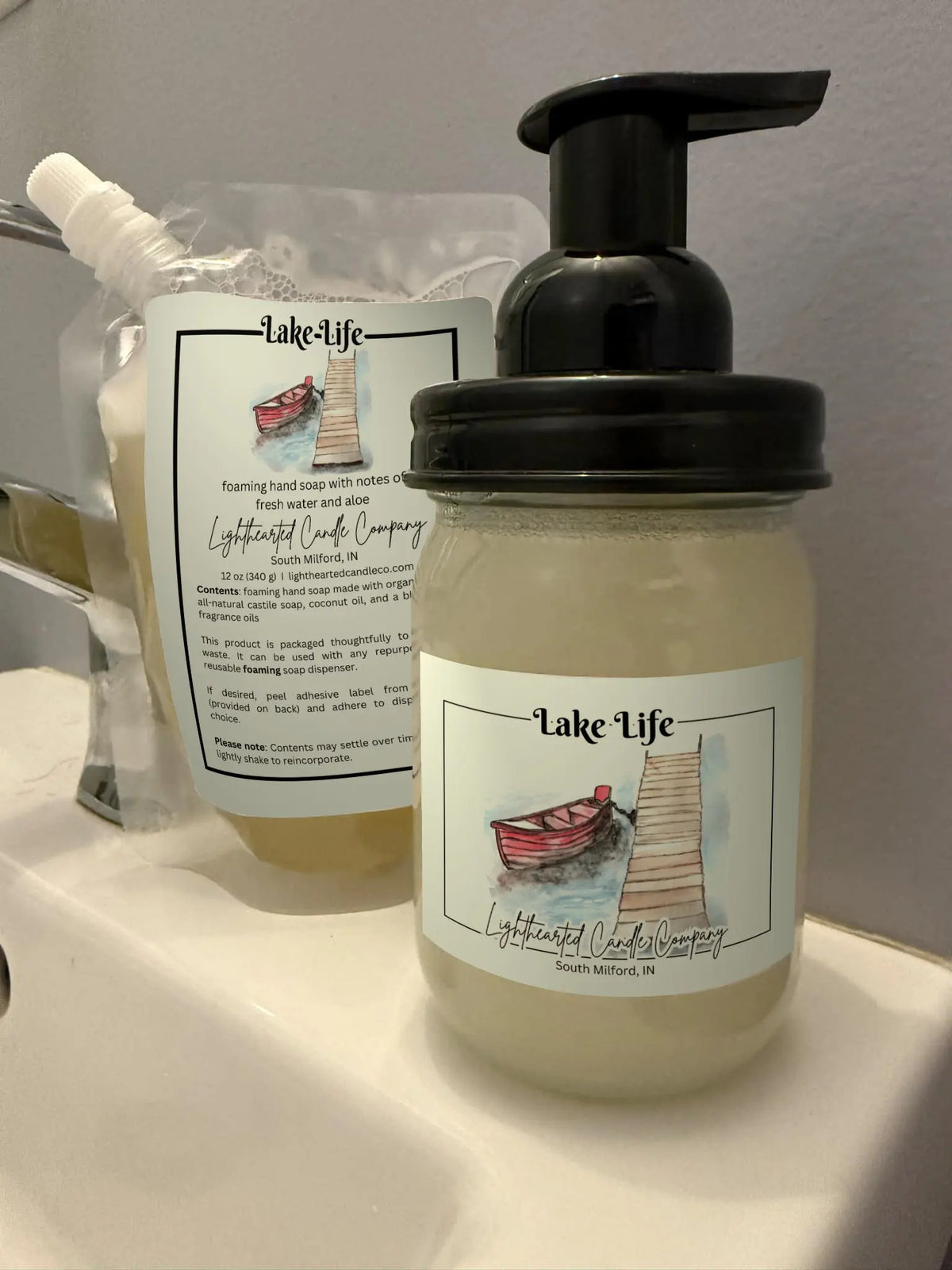 Lake Life foaming soap refill pouch and filled glass foaming dispenser shown together