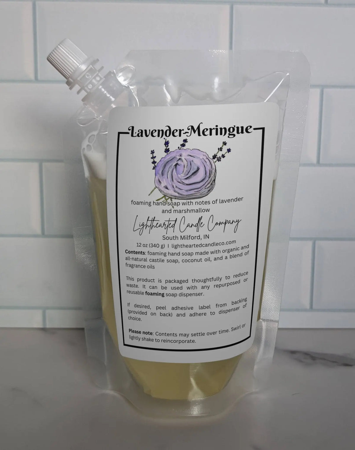 Lavender Meringue foaming soap refill pouch in a bright kitchen setting