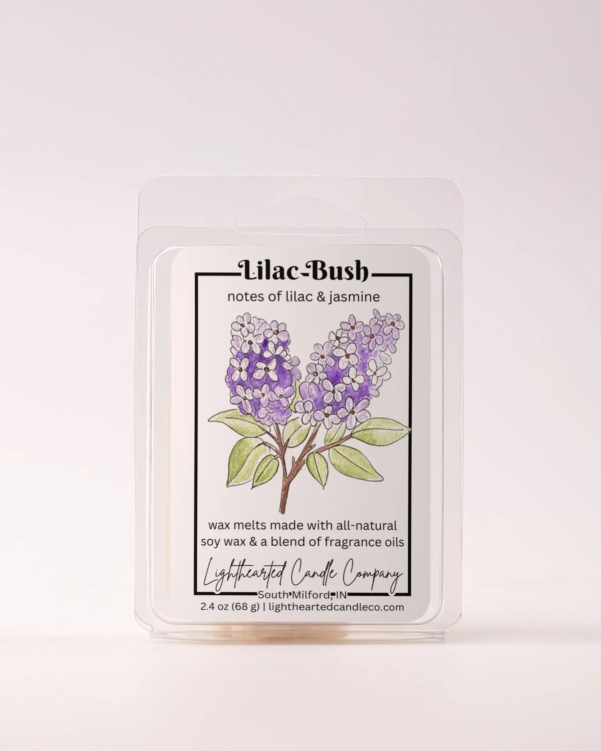 Single Lilac Bush Wax Melt 2.4 oz clamshell on a pale background