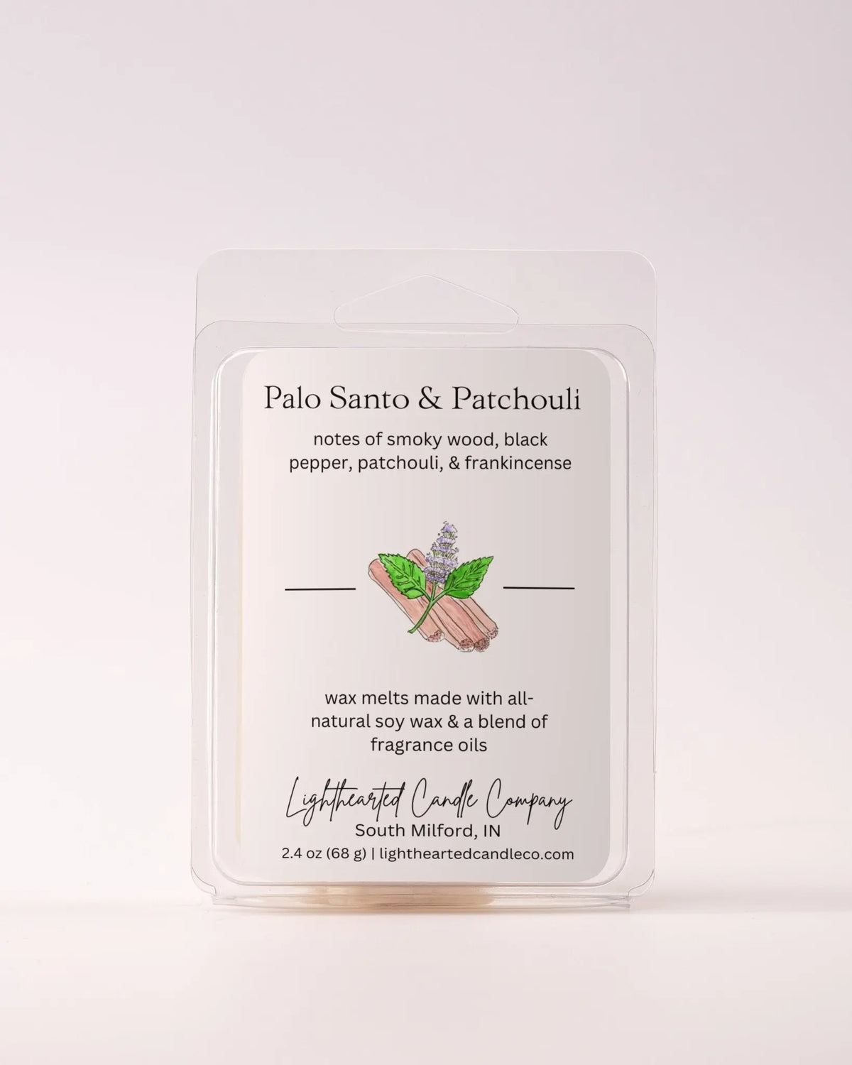 Single Palo Santo & Patchouli Wax Melt 2.4 oz clamshell on a pale background