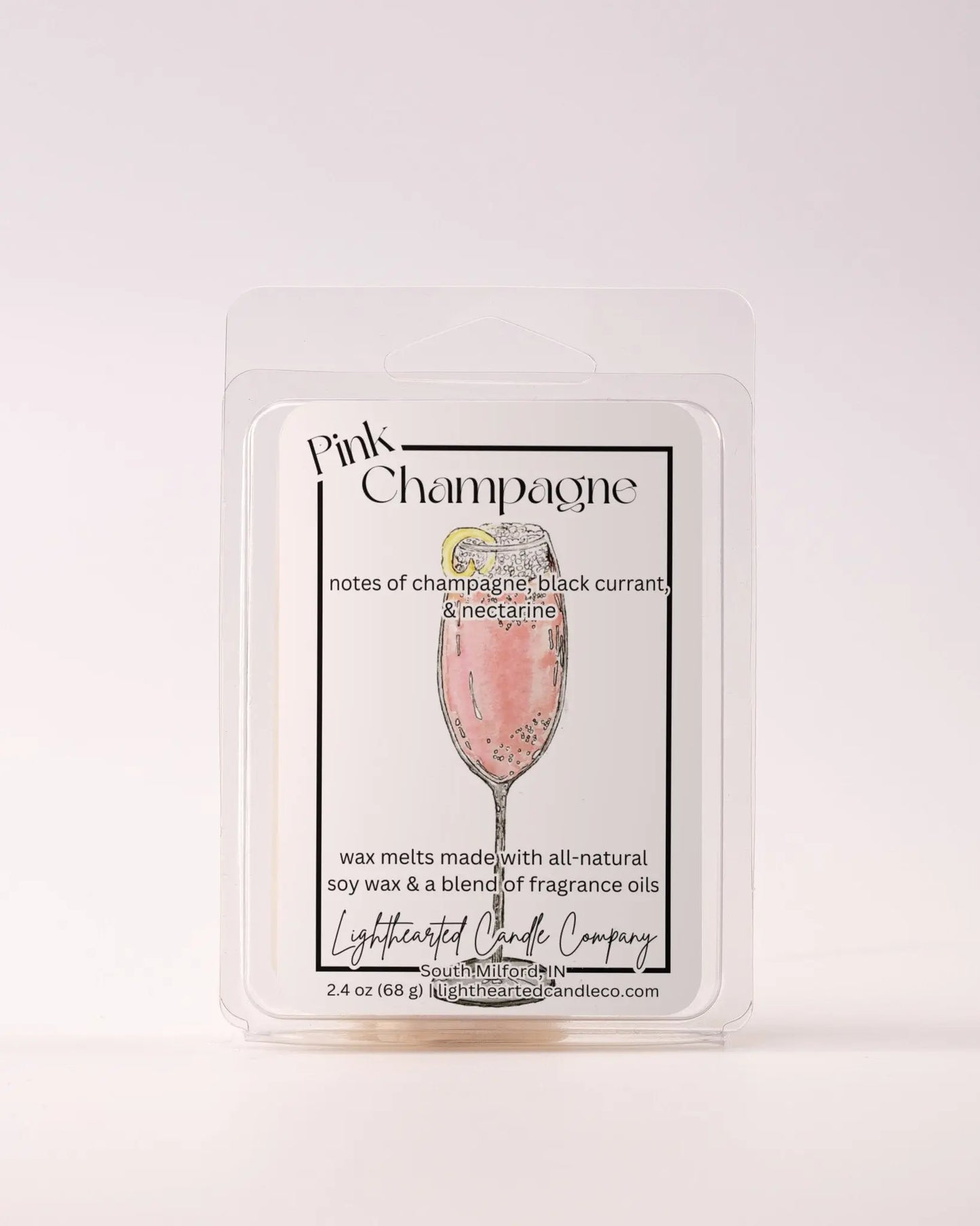 Single Pink Champagne Wax Melt 2.4 oz clamshell on a pale background