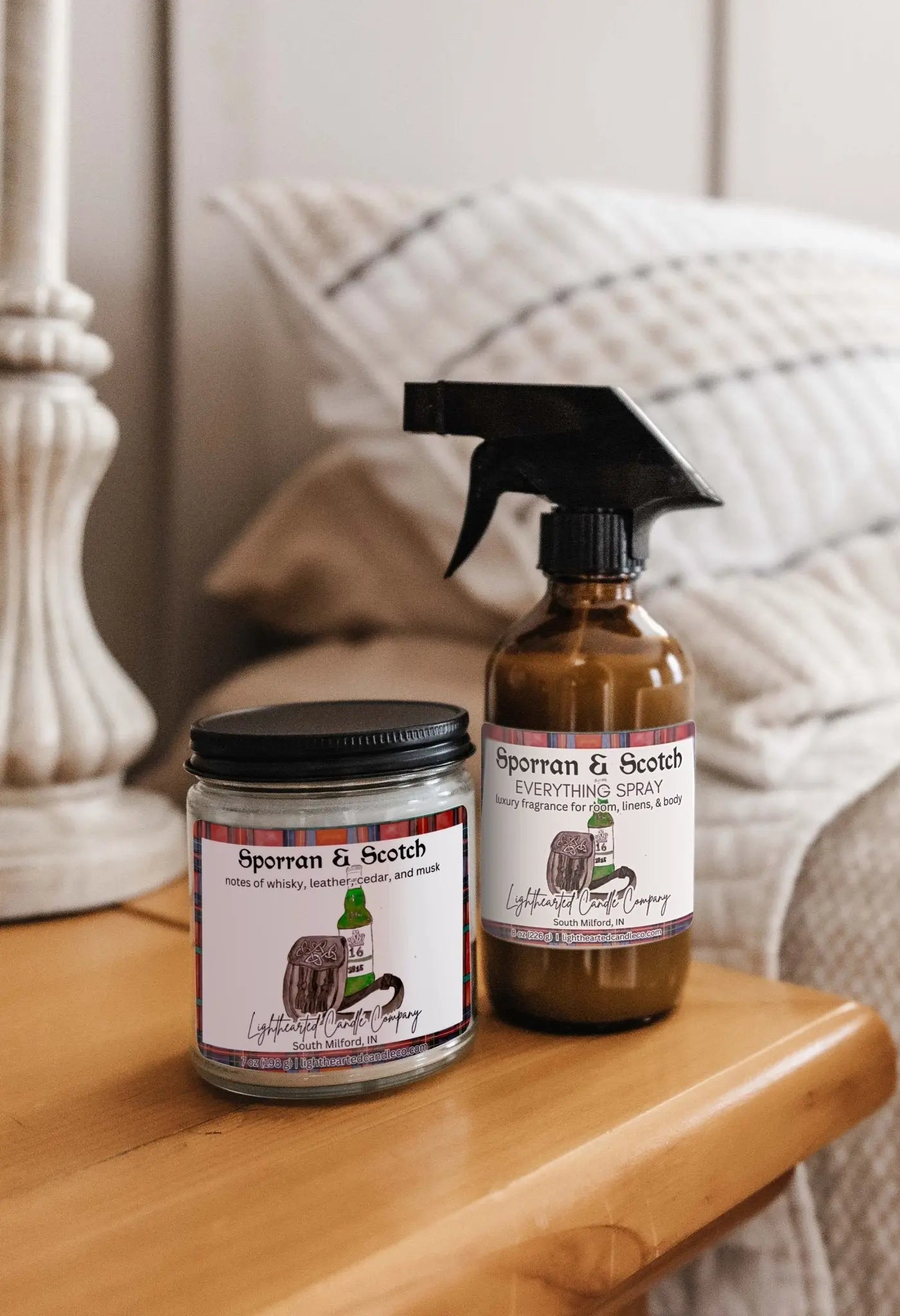 Matching candle and Sporran & Scotch Everything Spray styled on a bedside table