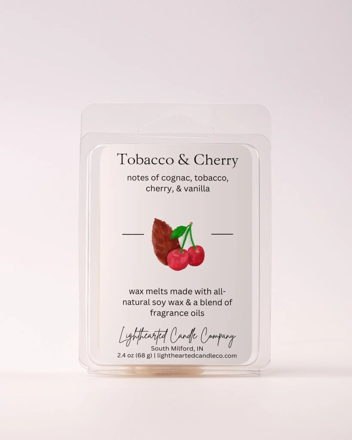 Single Tobacco & Cherry Wax Melt 2.4 oz clamshell on a pale background