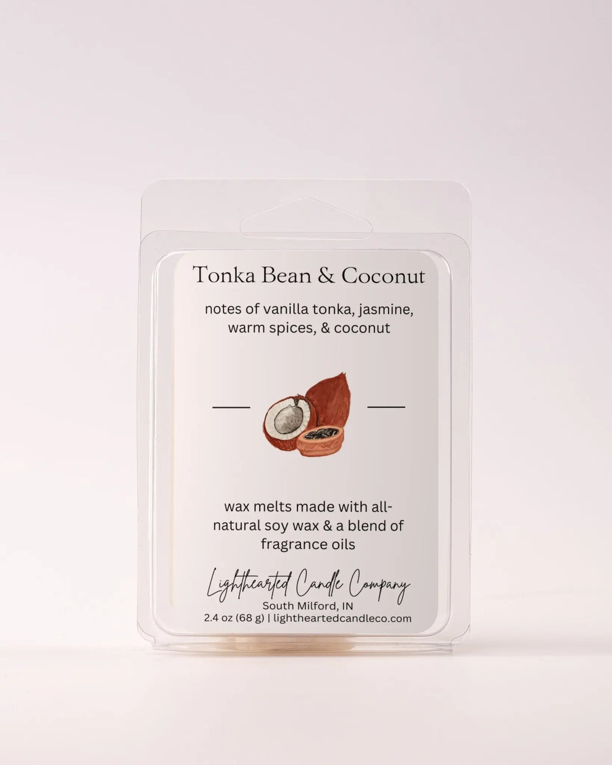 Single Tonka Bean & Coconut Wax Melt 2.4 oz clamshell on a pale background