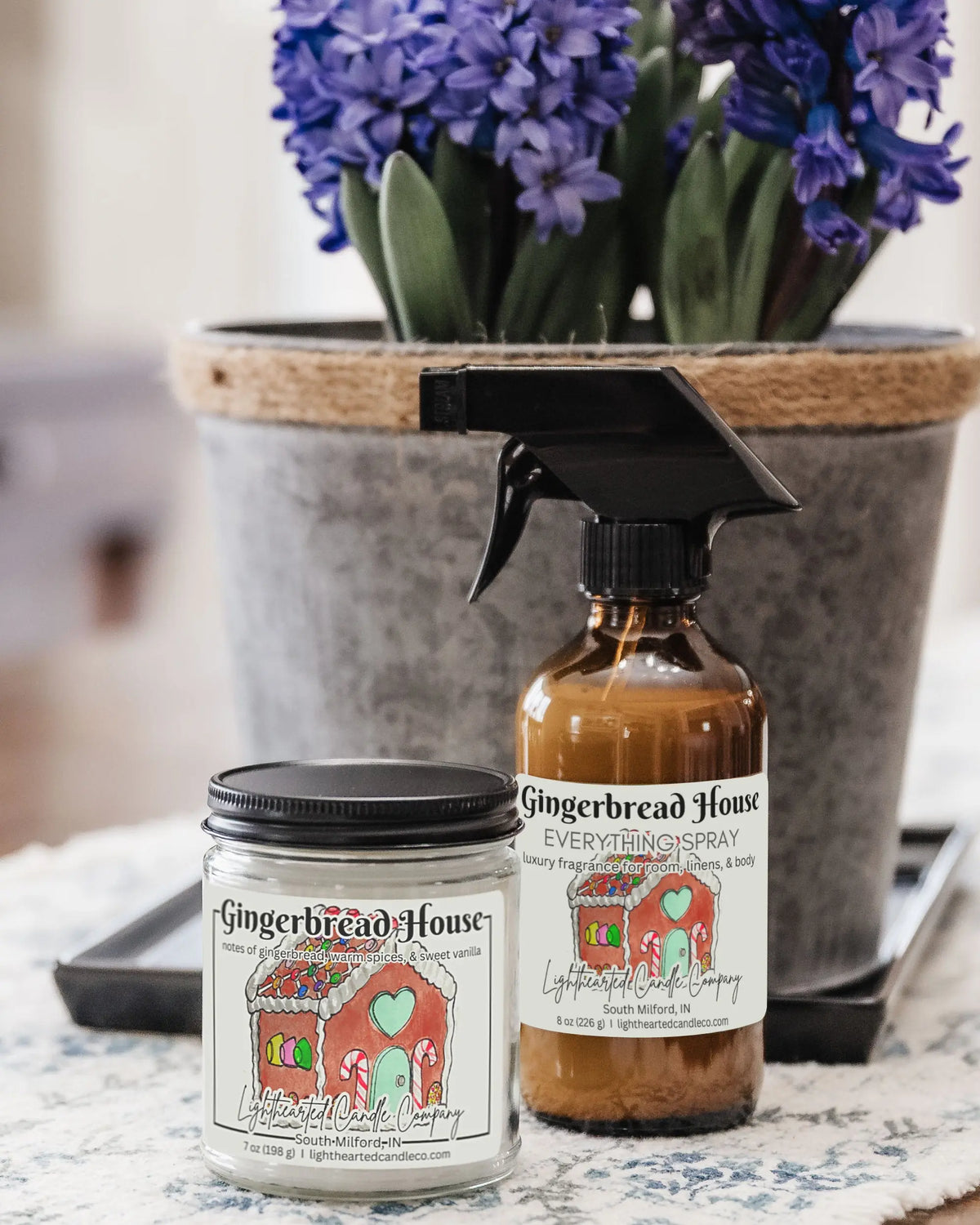 Alternate view Gingerbread House Candle in a clear glass jar with original watercolor artwork and a metal lid