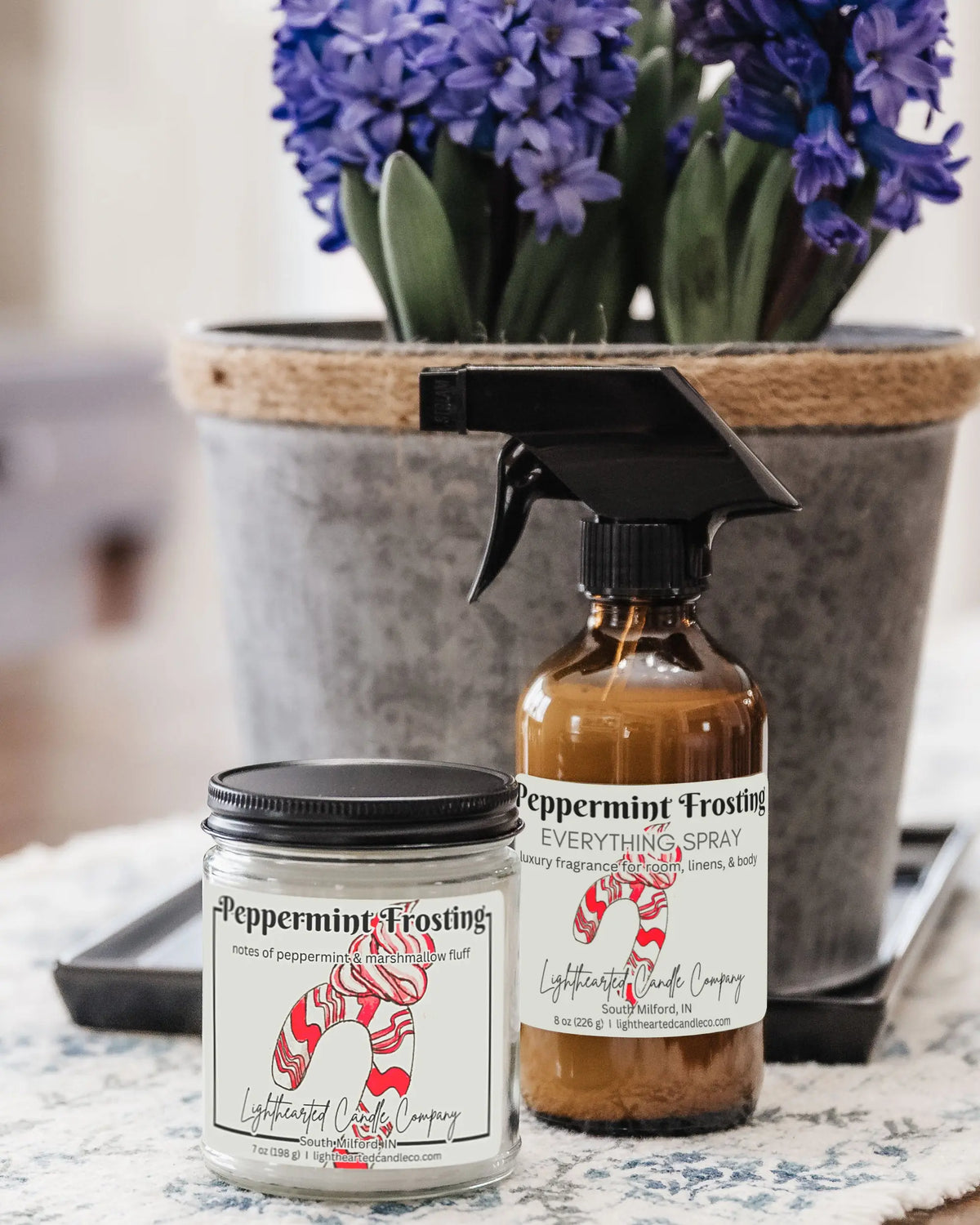 Peppermint Frosting Candle with a festive peppermint holiday label