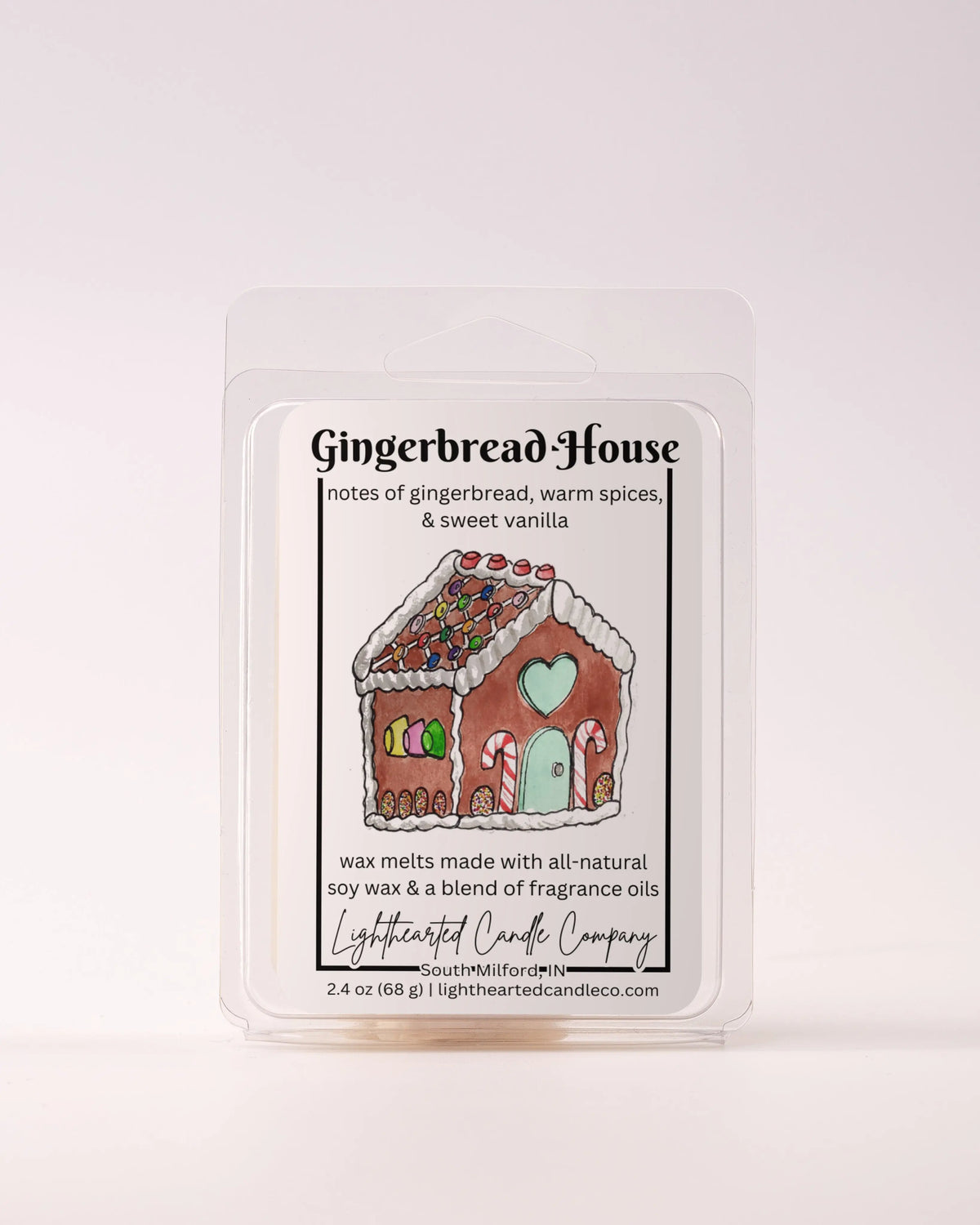 Single Gingerbread House Wax Melt 2.4 oz clamshell on a pale background