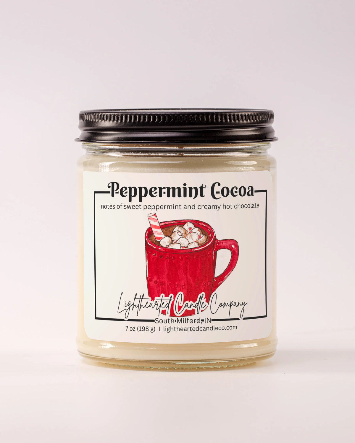 Closed Peppermint Cocoa Candle in a clear glass jar with a black metal lid