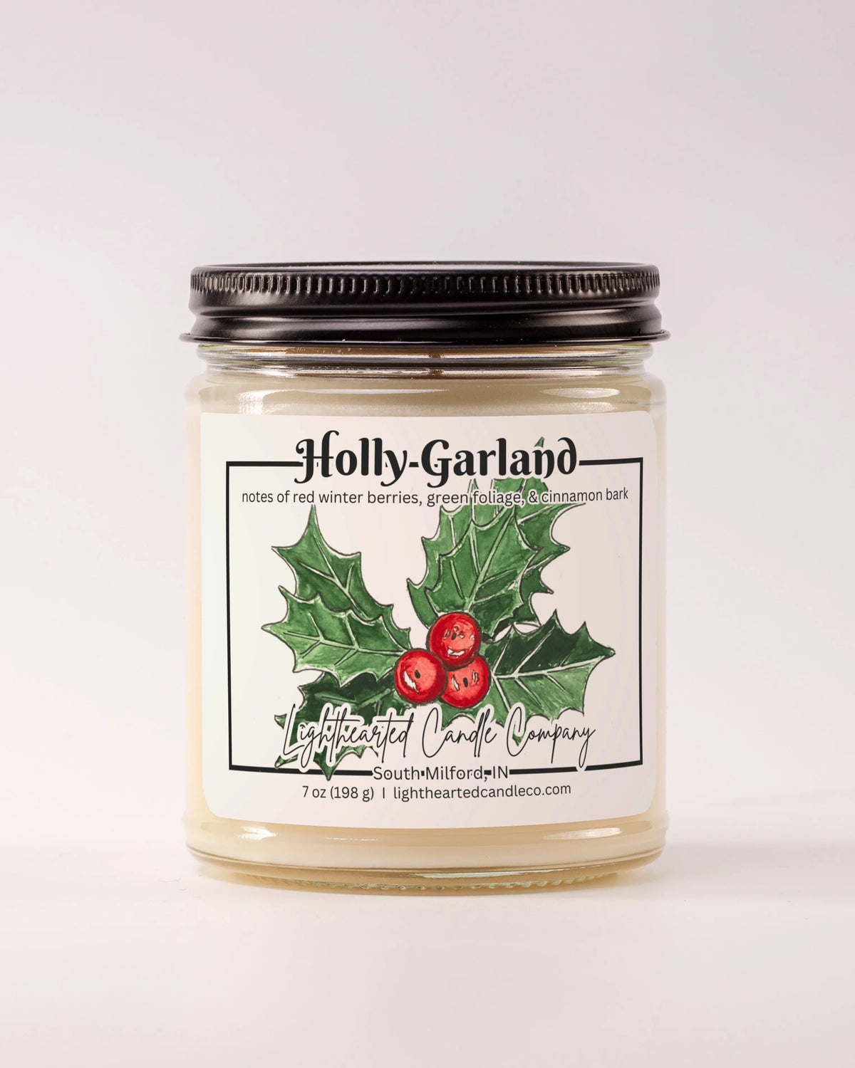 Alternate view Holly Garland Candle in a clear glass jar with original watercolor artwork and a metal lid
