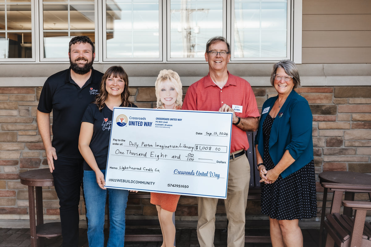 Check Presentation for Dolly Parton's Imagination Library in tandem with Crossroads United Way